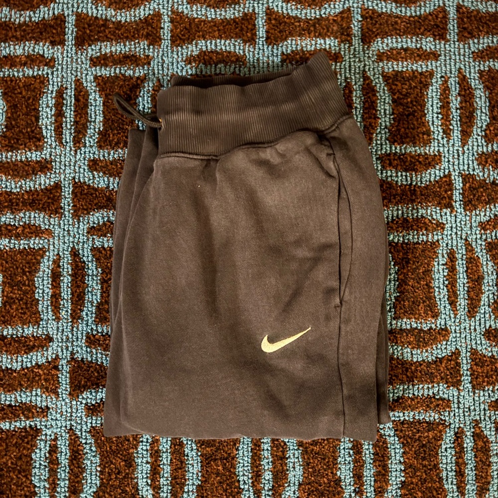 Nike Black Track Joggers with Gold Swoosh